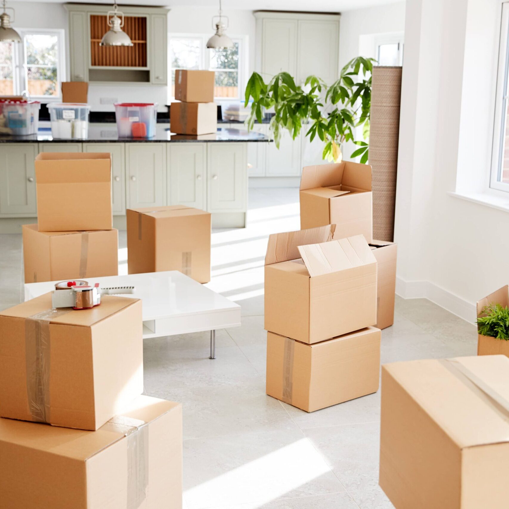 stacked-removal-boxes-in-empty-room-on-moving-day-2021-08-26-16-15-36-utc